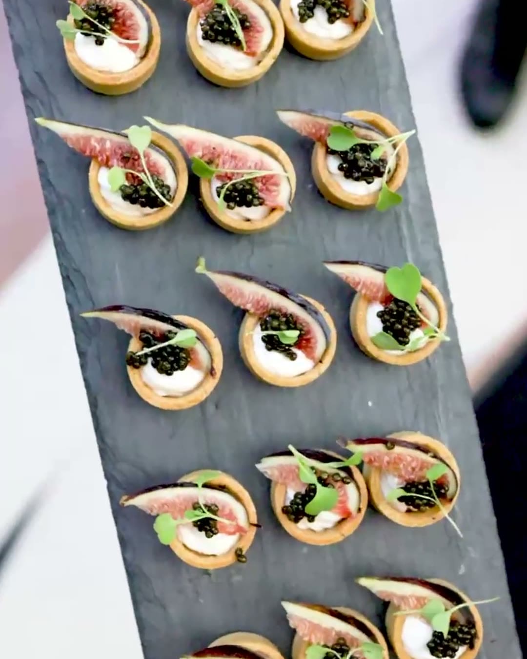 Shrimp and caviar tartlets on a slate