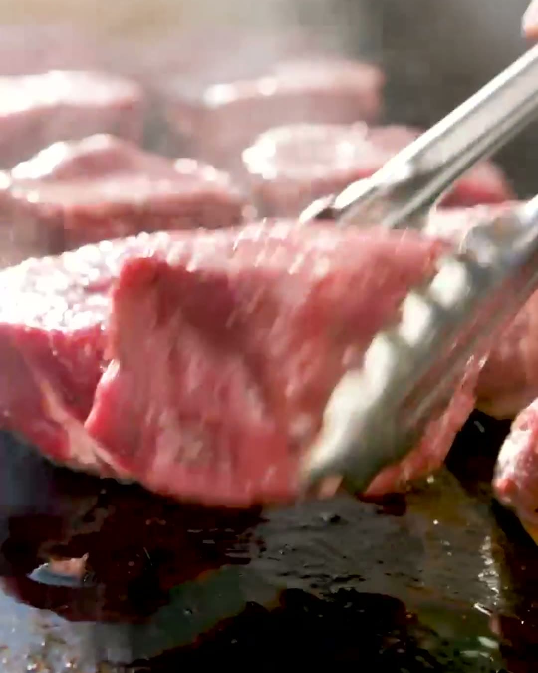 Steak searing on the grill